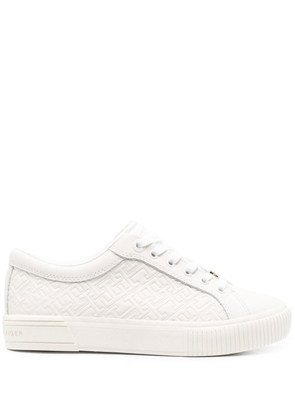 Tommy Hilfiger monogram-embossed low-top sneakers - White