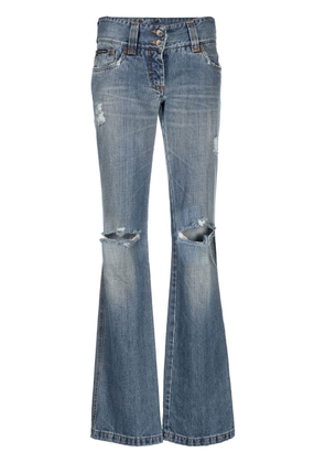 Dolce & Gabbana Pre-Owned 2000s ripped tapered jeans - Blue