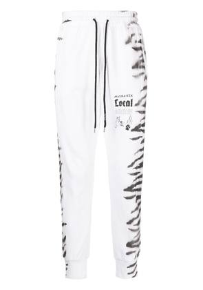 Mauna Kea tiger-print track pants - White