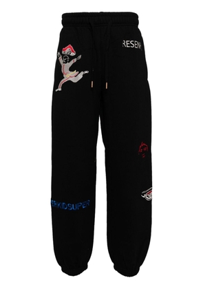 KidSuper embroidered-motif track pants - Black