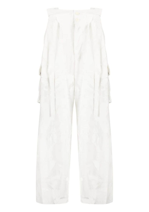 Taakk devoré-effect semi-sheer trousers - White