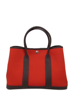 Hermès Pre-Owned 2022 Toile Officier Negonda Garden Party 30 TPM tote bag - Red