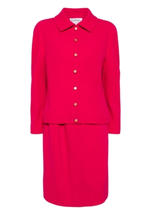 CHANEL Pre-Owned 1990 logo-buttons skirt suit - Pink