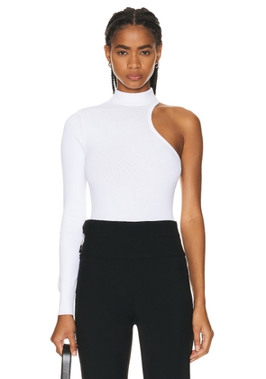 ALAÏA Cut Out Long Sleeve Bodysuit in Blanc - White. Size 42 (also in 44).
