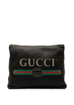 Gucci Pre-Owned 2016-2023 Leather Gucci Logo clutch bag - Black