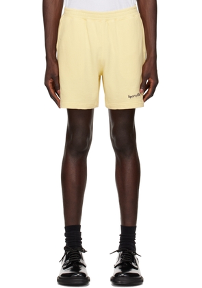 Sporty & Rich Yellow Serif Logo Gym Shorts
