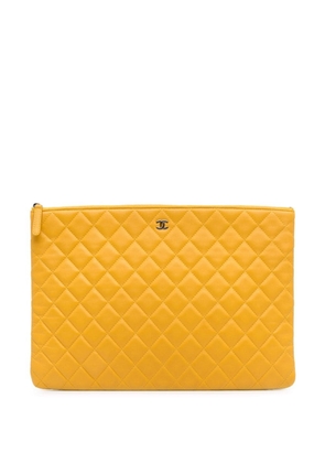 CHANEL Pre-Owned 2014 Quilted Lambskin O Case clutch bag - Yellow