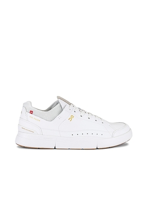 On The Roger Centere Court in White. Size 8.