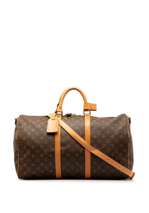 Louis Vuitton Pre-Owned 1994 Monogram Keepall Bandouliere 55 travel bag - Brown