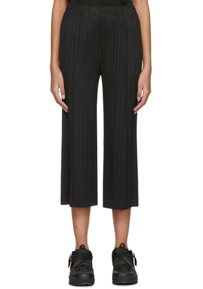 PLEATS PLEASE ISSEY MIYAKE Black Polyester Trousers