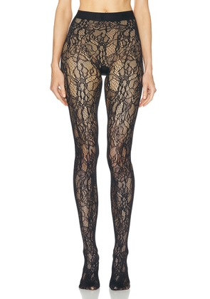 Wolford Floral Net Tights in Black - Black. Size M (also in S, XS).