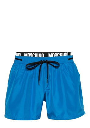 Moschino logo-waistband swim shorts - Blue