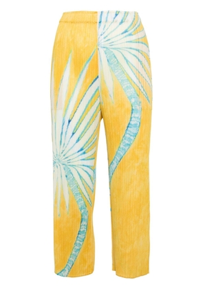 Pleats Please Issey Miyake palm-print plissé trousers - Yellow