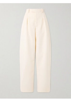 WARDROBE.NYC - + Hailey Bieber Pleated Wool-twill Tapered Pants - Ivory - xx small,x small,small,medium,large,x large