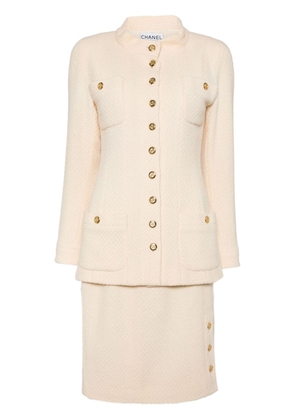 CHANEL Pre-Owned 2019 logo-buttons skirt suit - Neutrals