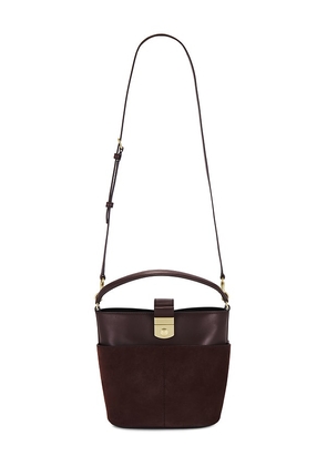 Veronica Beard The Crest Lock Bucket Bag in Burgundy.