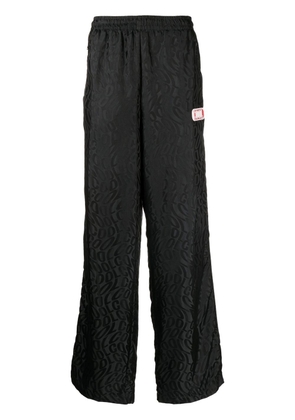 COOL T.M monogram-print wide trousers - Black