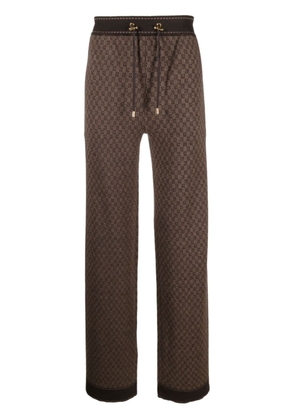 Balmain monogram-print merino trousers - Brown