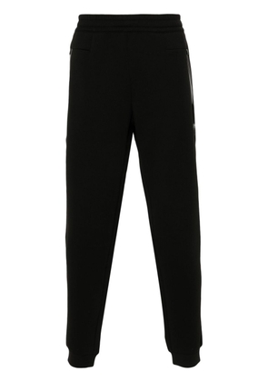 Ea7 Emporio Armani rubberised logo track pants - Black