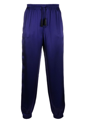 Saint Laurent tapered-leg silk trousers - Purple