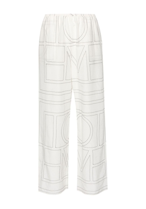 TOTEME embroidered-monogram pyjama trousers - White