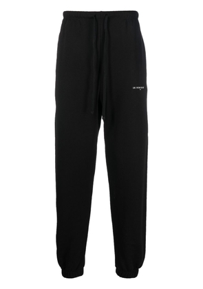 Ih Nom Uh Nit logo-print cotton track pants - Black