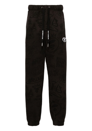 AAPE BY *A BATHING APE® graphic-print drawstring track pants - Black