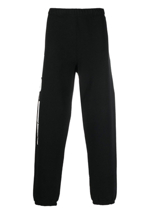 Heron Preston logo-print tracksuit bottoms - Black