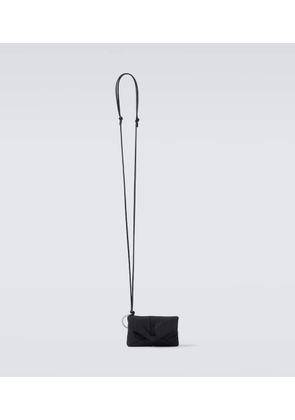 Saint Laurent Cassandre Mini leather-trimmed crossbody bag