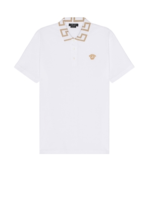 VERSACE Polo in Optical White - White. Size L (also in M, S, XL).