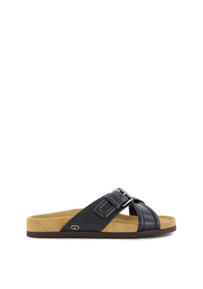 Valentino Slip-On Logo Plaque Leather Sandals