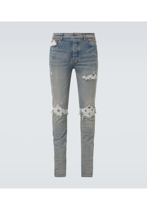 Amiri Micro Starburst distressed skinny jeans