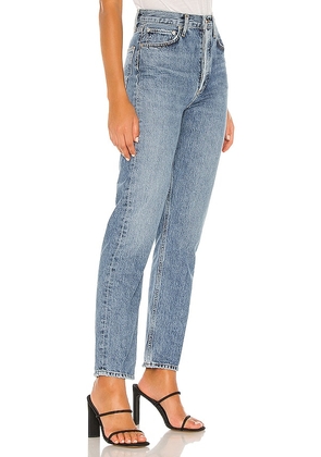 AGOLDE 90's Pinch Waist Jeans in Blue. Size 23. Also in 24, 25, 26, 27, 28, 29, 30, 31, 32, 33, 34.