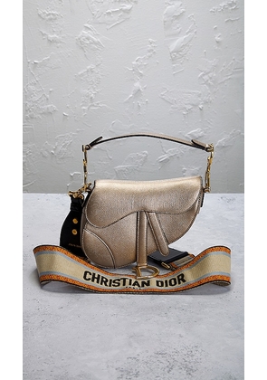 FWRD Renew Dior Mini Saddle Bag in Metallic Gold.