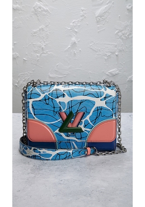 FWRD Renew Louis Vuitton Twist MM Shoulder Bag in Baby Blue.