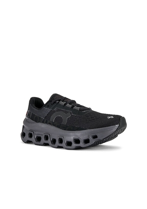 On Cloudmonster Sneaker in Black. Size 5. Also in 10, 10.5, 11, 6, 6.5, 7, 7.5, 8, 8.5, 9, 9.5.