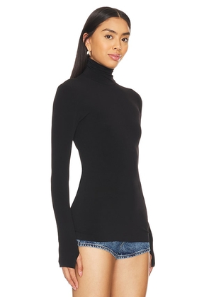 Norma Kamali Slim Fit Long Sleeve Turtleneck Top in Black. Size L. Also in M.