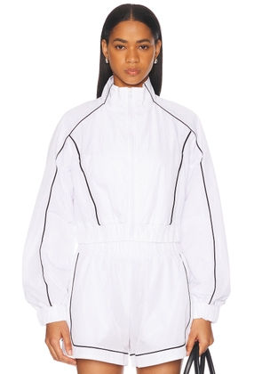 alo Motivate Full Zip Track Jacket in White & Black - White. Size M (also in L, S, XS).