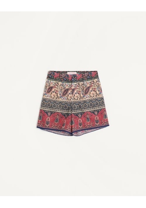 Valentino COTTON MUSLIN BERMUDA SHORTS WITH VOYAGE IMAGINAIRE PRINT AND PASSEMENTERIE TRIM Man MULTICOLOUR 48