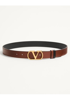 Valentino Garavani VLOGO SIGNATURE REVERSIBLE SHINY CALFSKIN BELT - 30MM / 1.2 IN. Man DEEP CARAMEL/BLACK 085