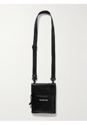 Balenciaga - Explorer Logo-Print Cracked-Leather Messenger Bag - Men - Black