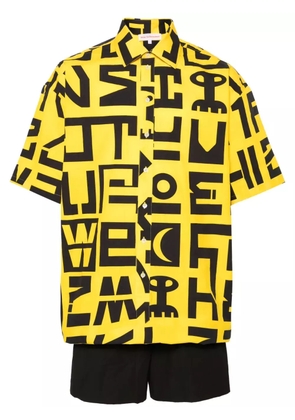 Walter Van Beirendonck logo-print cotton jumpsuit - Yellow