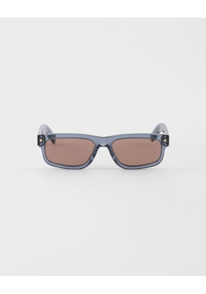 Sunglasses with the iconic metal plaque