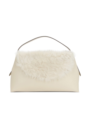 Toteme Shearling T-Lock Top Handle Bag in Ecru - Ivory. Size all.