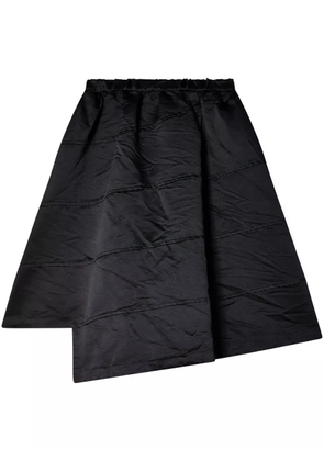 Black Comme Des Garçons asymmetric mini skirt