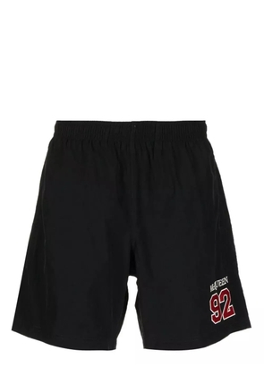 Alexander McQueen embroidered-logo swim shorts - Black