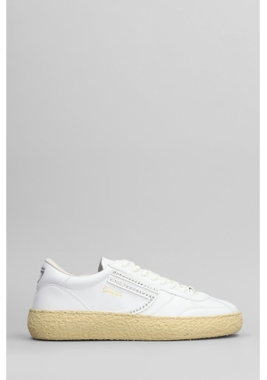 Puraai Stud Sneakers In White Leather