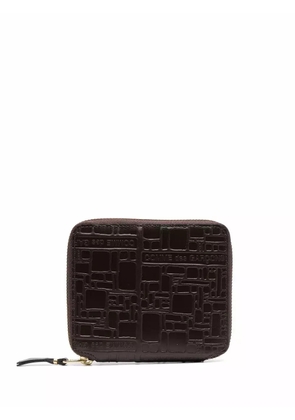 Comme Des Garçons Wallet embossed-logo wallet - Brown
