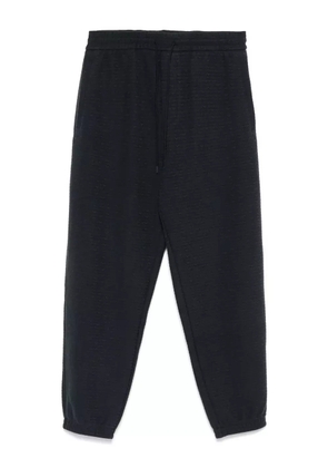 Emporio Armani logo-jacquard track pants - Blue