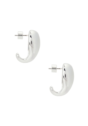 Ettika Fluidity Earrings in Metallic Silver.